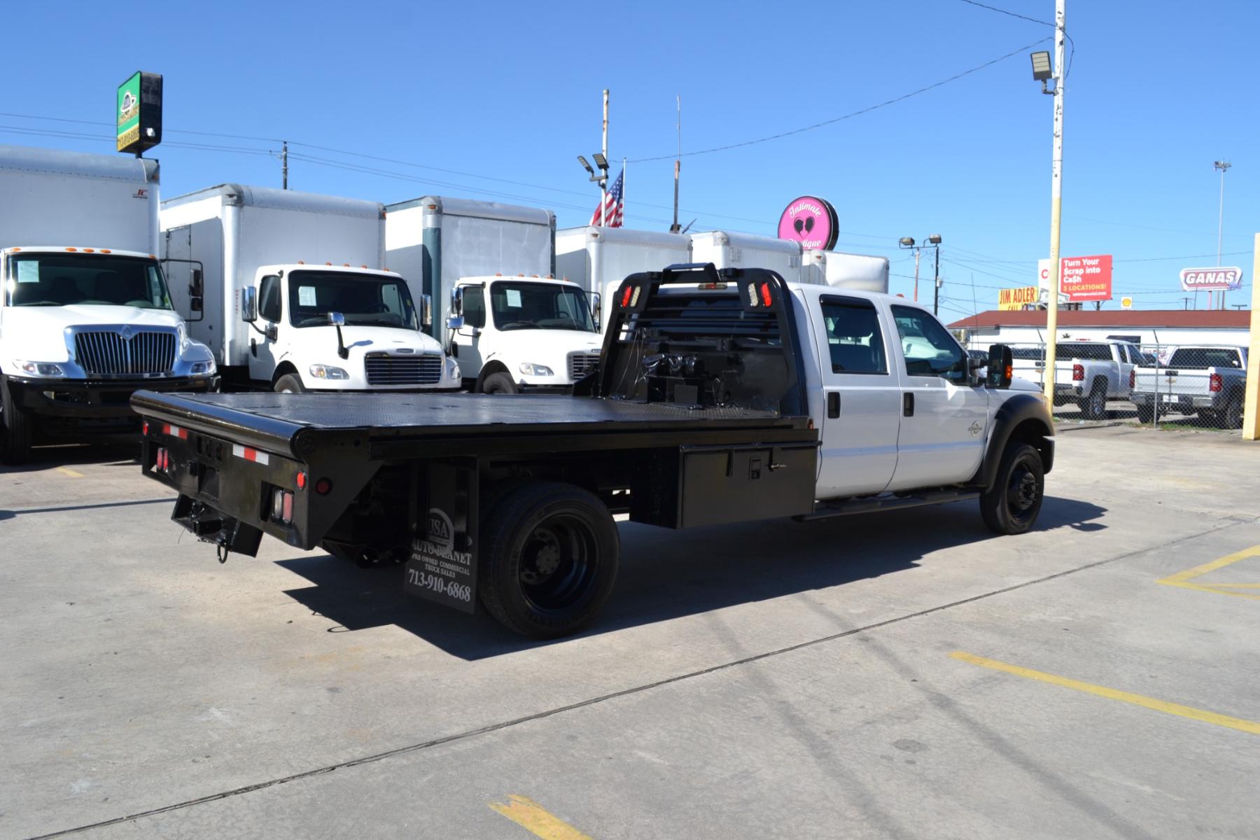 2013 WHITE Ford F550 with an POWERSTROKE 6.7L DIESEL engine, AUTOMATIC transmission, located at 9172 North Fwy, Houston, TX, 77037, (713) 910-6868, 29.887470, -95.411903 - CREW CAB, 11FT FLATBED, BUMPER PULL HITCH, 19,000LB GVWR , 4X4, POWER WINDOWS , LOCKS & MIRRORS, CRUISE CONTROL, COLD A/C - Photo #4
